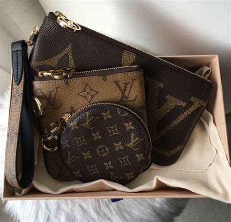 louis vuitton trio pouch.